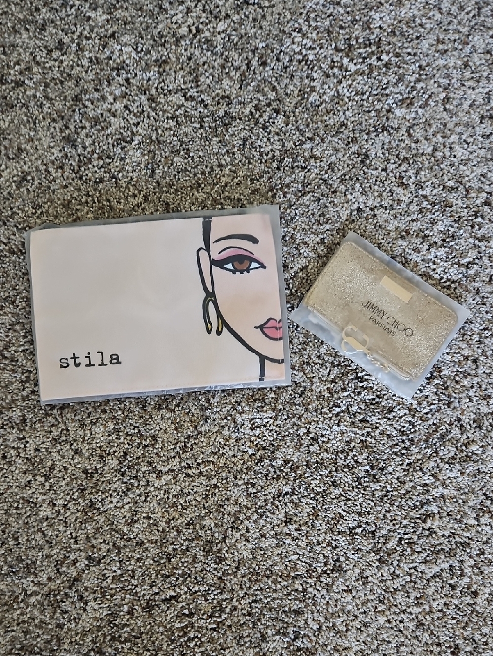 Stila & Jimmy Choo Bags